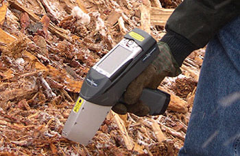 Innov-X XRF analyzer used for soil sampling in the field